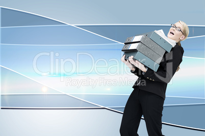 Composite image of businesswoman carrying folders