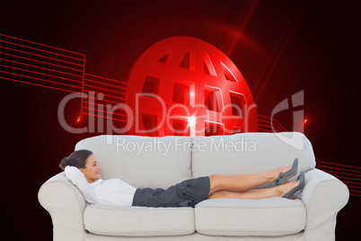 Composite image of smiling business woman lying down on the couc