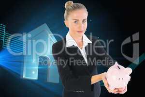 Composite image of businesswoman holding piggy bank