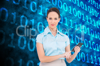 Composite image of serious classy businesswoman using calculator