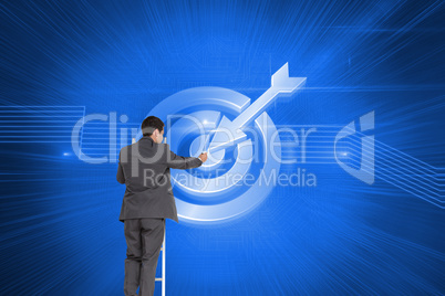 Composite image of businessman standing on ladder