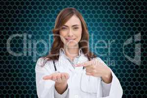 Composite image of smiling doctor presenting her hand