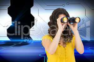 Composite image of casual young woman using binoculars