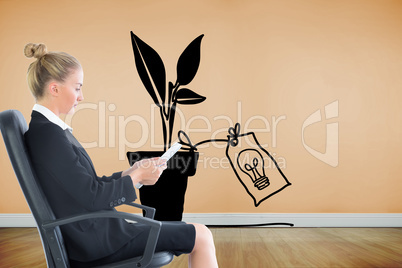 Composite image of businesswoman sitting on swivel chair with ta