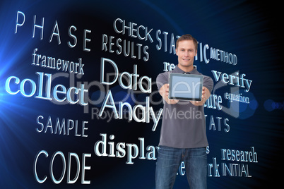 Composite image of young man showing screen of his tablet comput