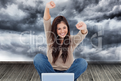 Composite image of woman looks straight ahead as she celebrates