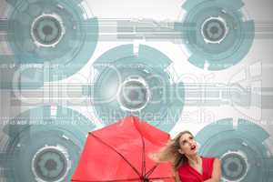 Composite image of elegant blonde holding umbrella