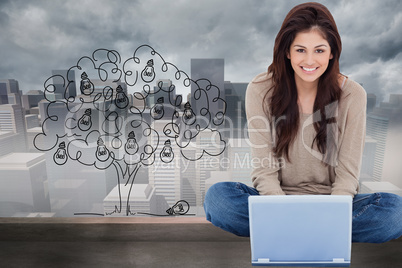 Composite image of woman sitting on the bed with the laptop in f