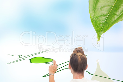 Composite image of businesswoman touching something