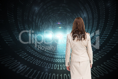 Composite image of classy businesswoman walking away from camera