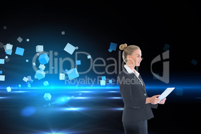 Composite image of businesswoman holding new tablet