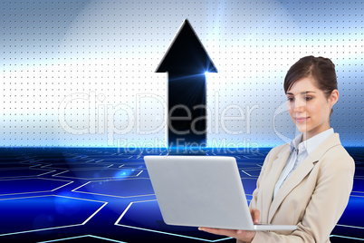 Composite image of confident businesswoman holding laptop