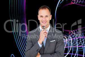 Composite image of smiling businessman holding glasses