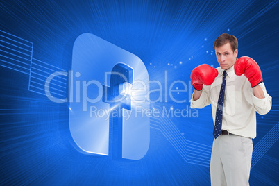 Composite image of businessman with his boxing gloves ready to f