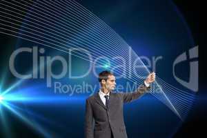 Composite image of stern businessman pointing