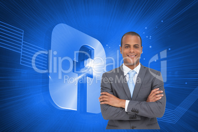 Composite image of charismatic young businessman with arms cross