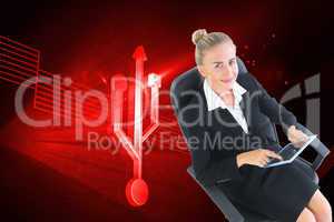 Composite image of businesswoman sitting on swivel chair with ta