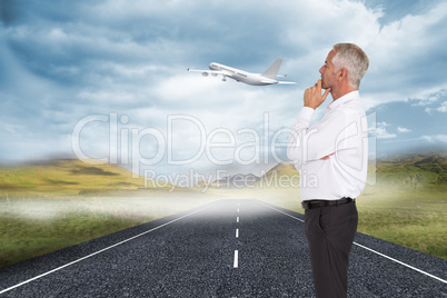 Composite image of thoughtful businessman posing