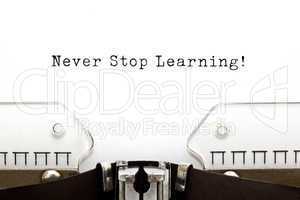 never stop learning typewriter