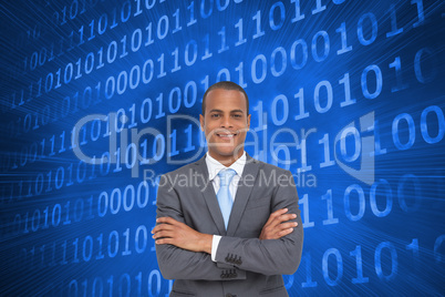 Composite image of charismatic young businessman with arms cross