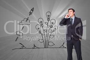 Composite image of happy businessman phoning