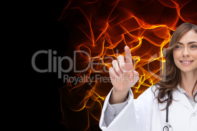 Composite image of smiling doctor pointing