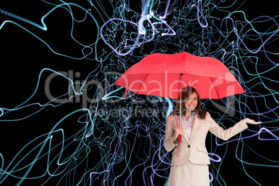 Composite image of happy businesswoman holding umbrella