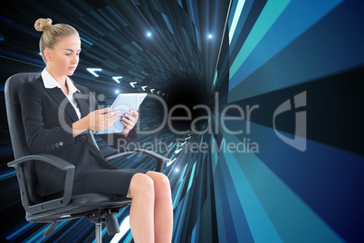 Composite image of businesswoman sitting on swivel chair with ta