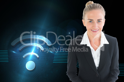 Composite image of businesswoman holding tablet