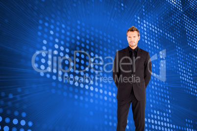 Composite image of young businessman looking at the camera