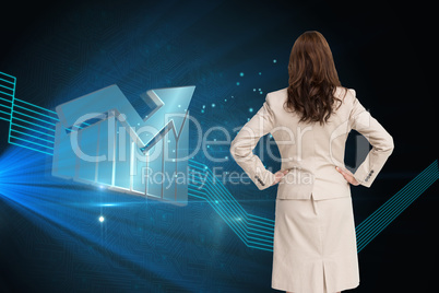 Composite image of businesswoman standing back to camera