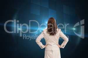 Composite image of businesswoman standing back to camera