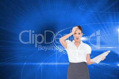 Composite image of shocked classy businesswoman holding newspape