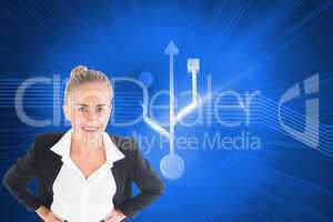 Composite image of businesswoman standing with hands on hips