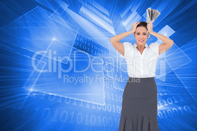 Composite image of worried stylish businesswoman holding newspap