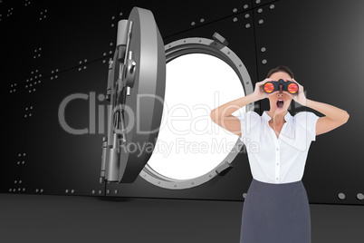 Composite image of shocked elegant businesswoman looking through