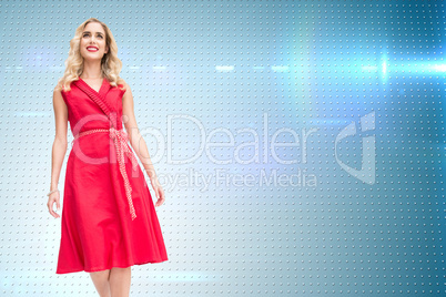 Composite image of smiling blonde walking