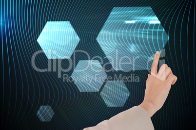 Composite image of businesswoman pointing