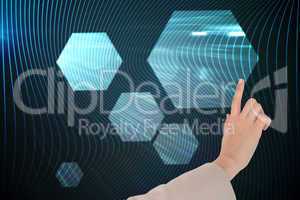 Composite image of businesswoman pointing