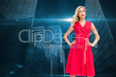 Composite image of elegant blonde standing hands on hips