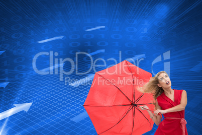 Composite image of elegant blonde holding umbrella