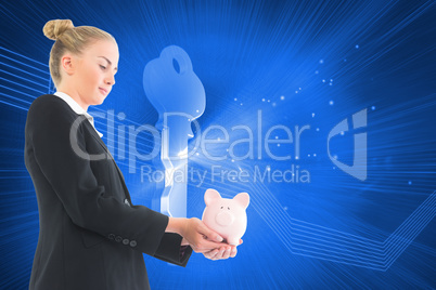 Composite image of businesswoman holding piggy bank