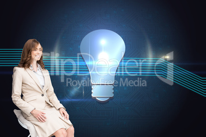 Composite image of smiling businesswoman sitting