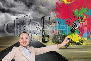 Composite image of smiling asian businesswoman pointing