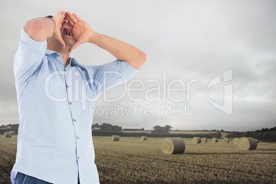 Composite image of shouting casual man standing