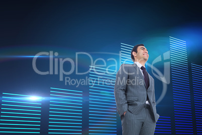 Composite image of smiling businessman standing