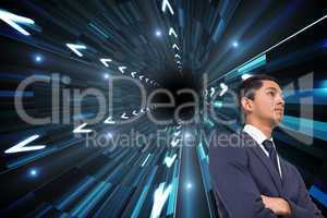 Composite image of unsmiling asian businessman with arms crossed