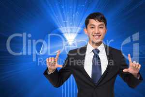 Composite image of smiling businessman holding