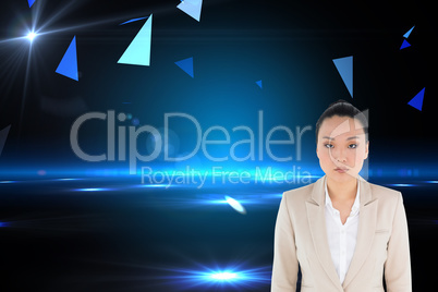 Composite image of unsmiling asian businesswoman