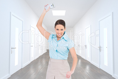 Composite image of furious classy businesswoman throwing her cal